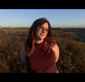 Randi standing in a field