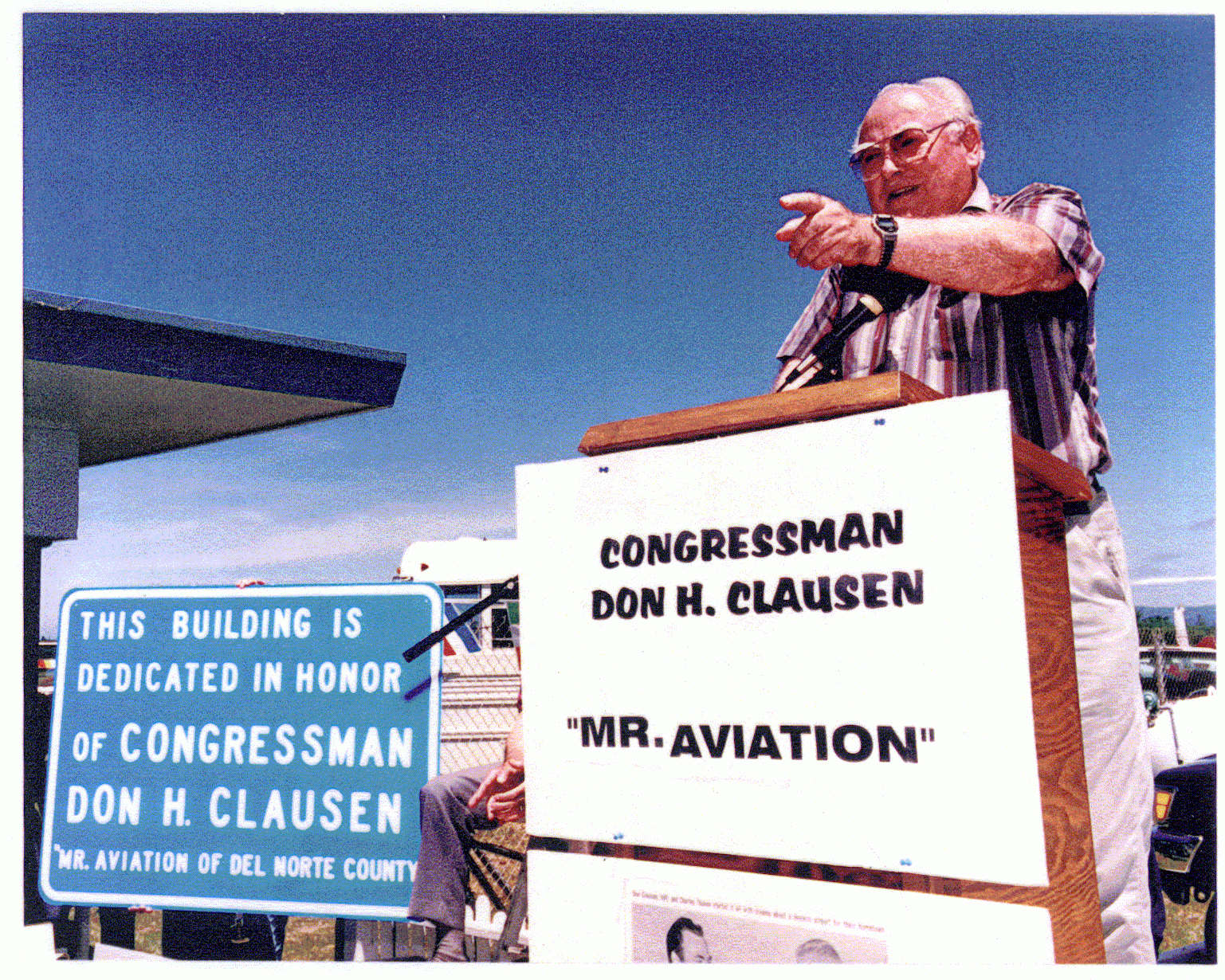 Clausen at the dedication of an airport terminal