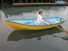 Joan Berman in a rowboat