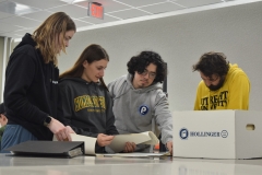 students with archival material